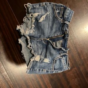 American Eagle Low rise lightly ripped jean shorts in a dark wash